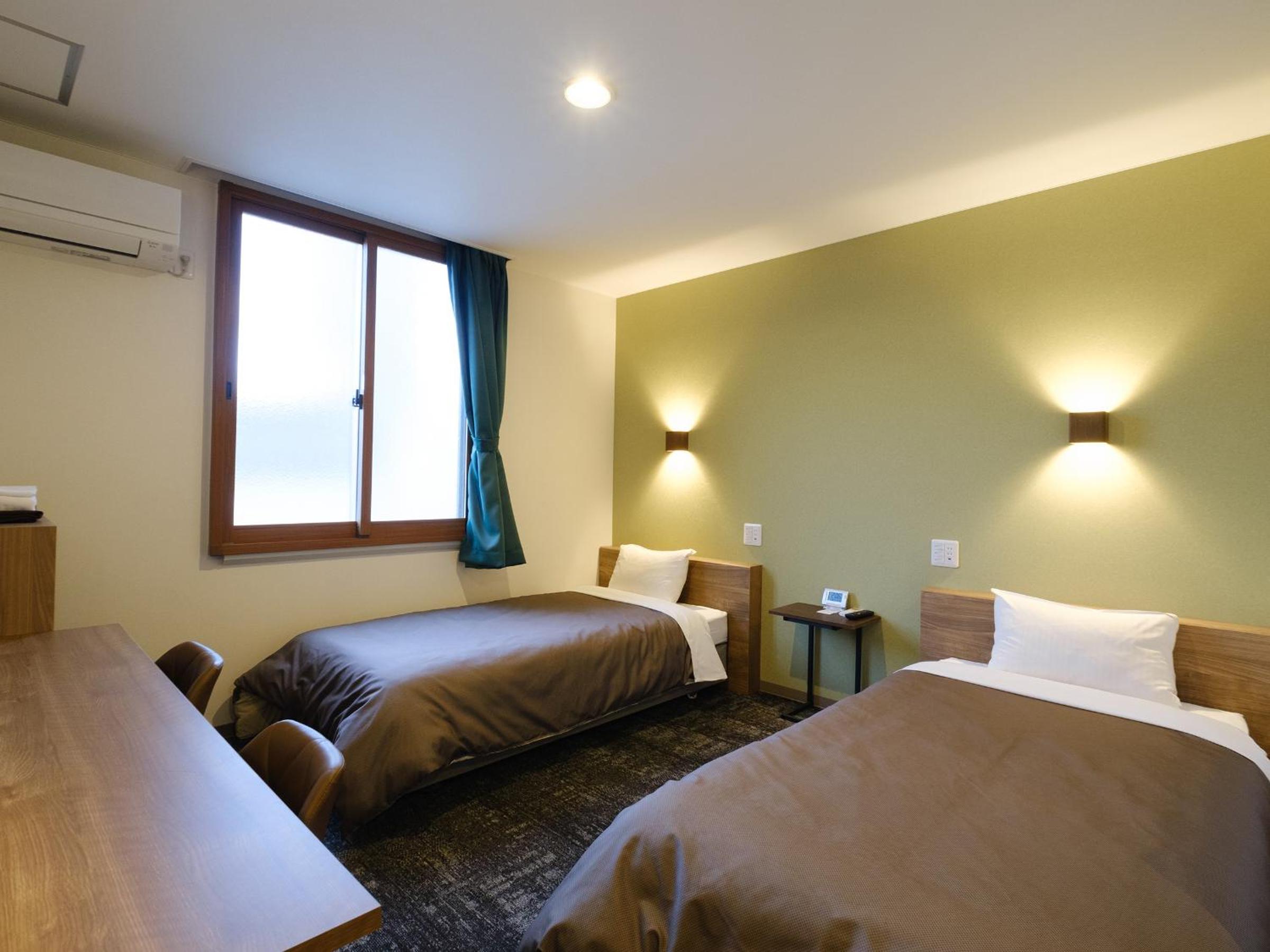 غرفة بسريرين منفصلين، Matsuyama New Grand Hotel 4/10