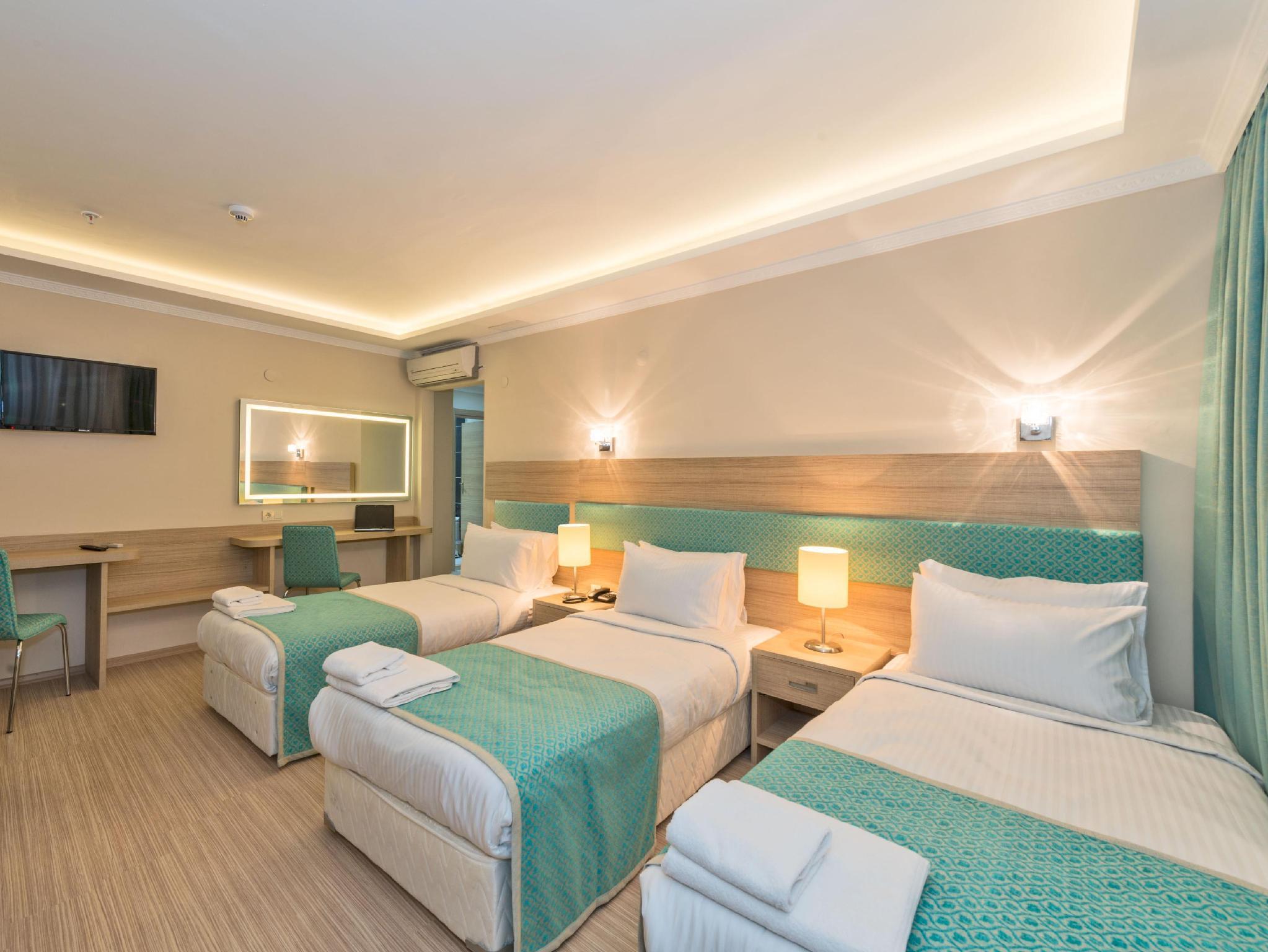 Room, Triple, 1 Double and 4 Single Beds