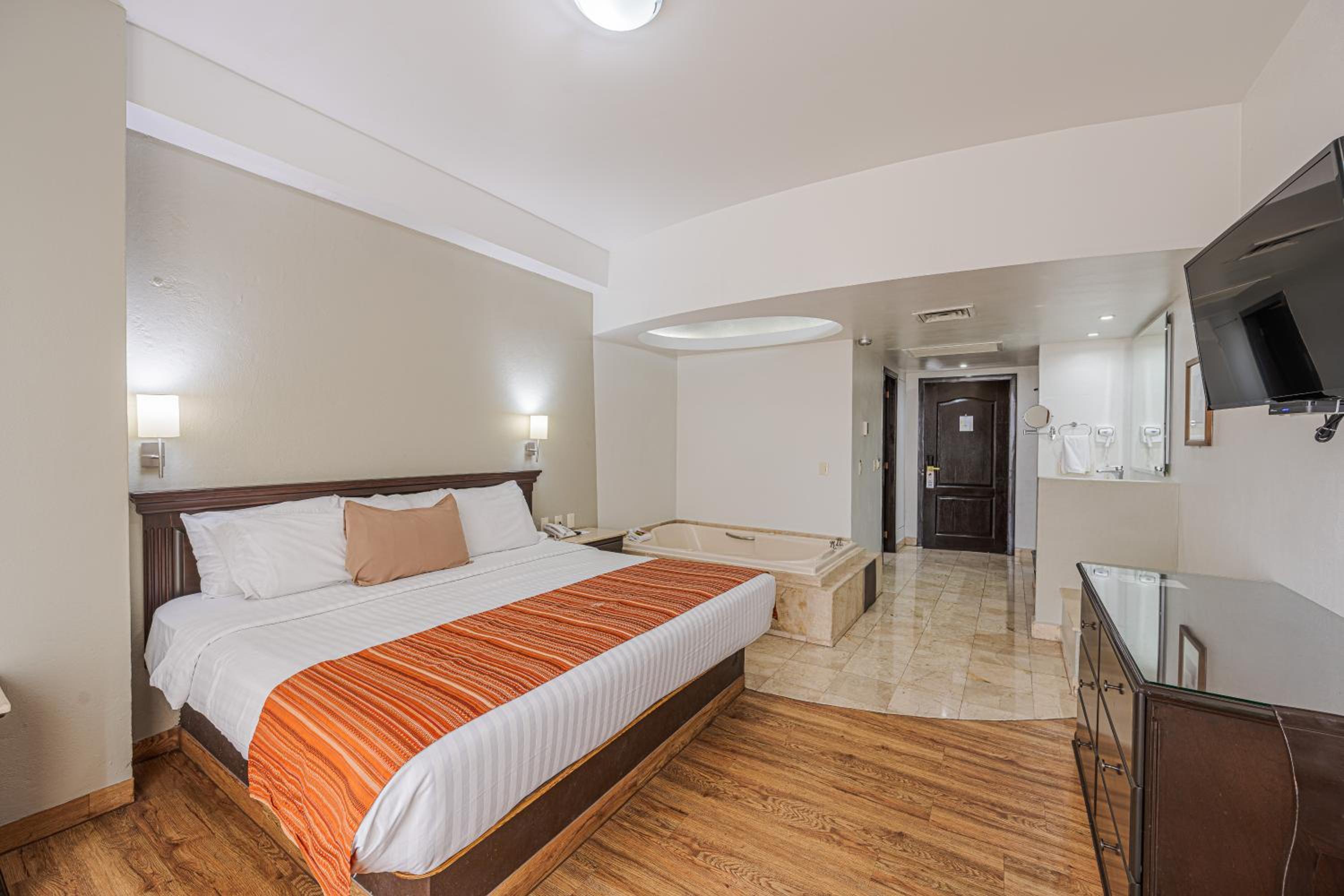 غرفة بسرير كوين بجاكوزي، HG HOTEL 2/10