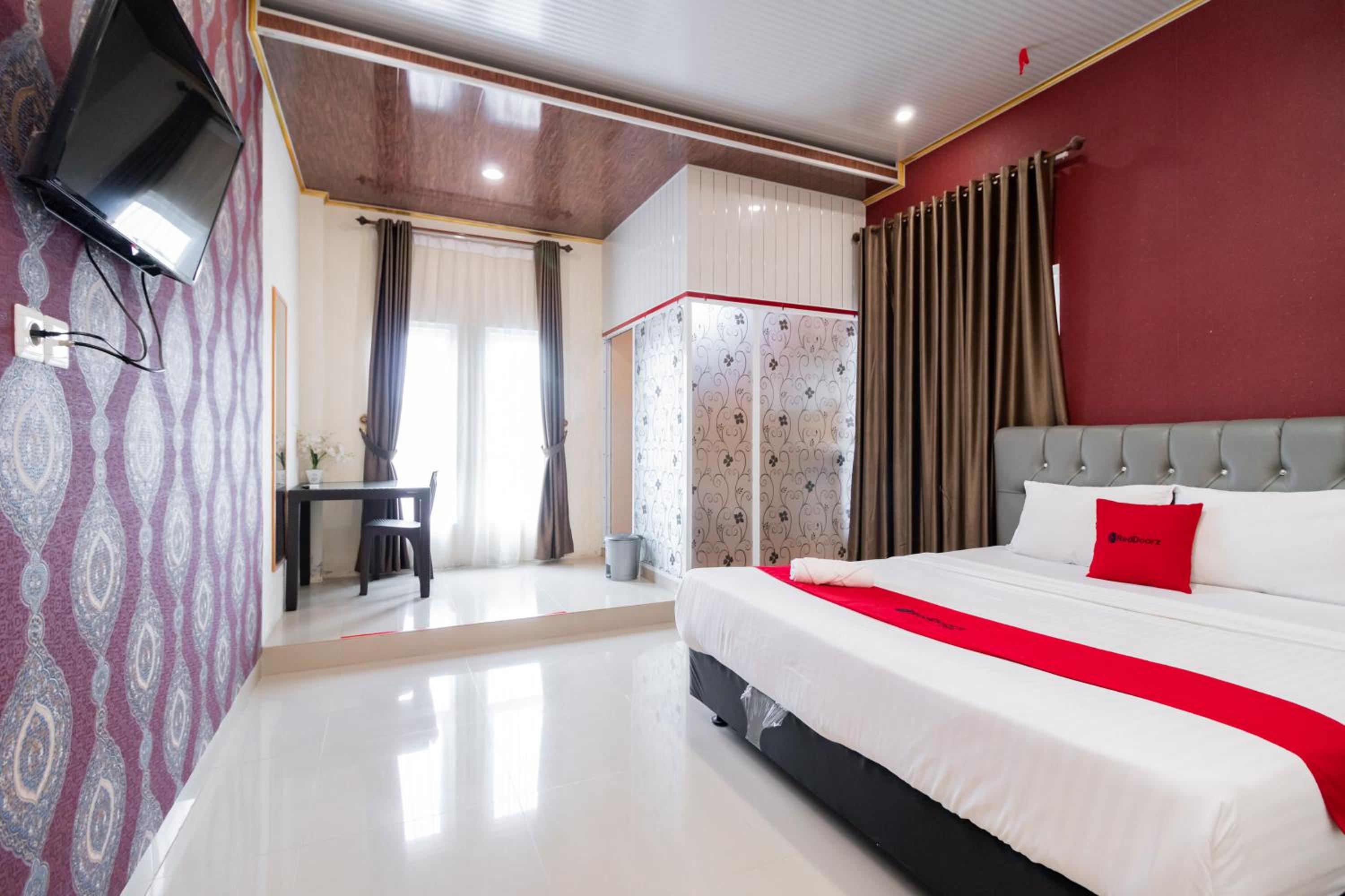 OYO 1648 Penginapan Three Joye 16/47