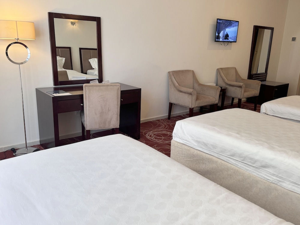 غرفة قياسية رباعية بأربعة أسرّة، ابراج الريان المكية(Al Rayyan Makiya Towers Hotel) 6/9