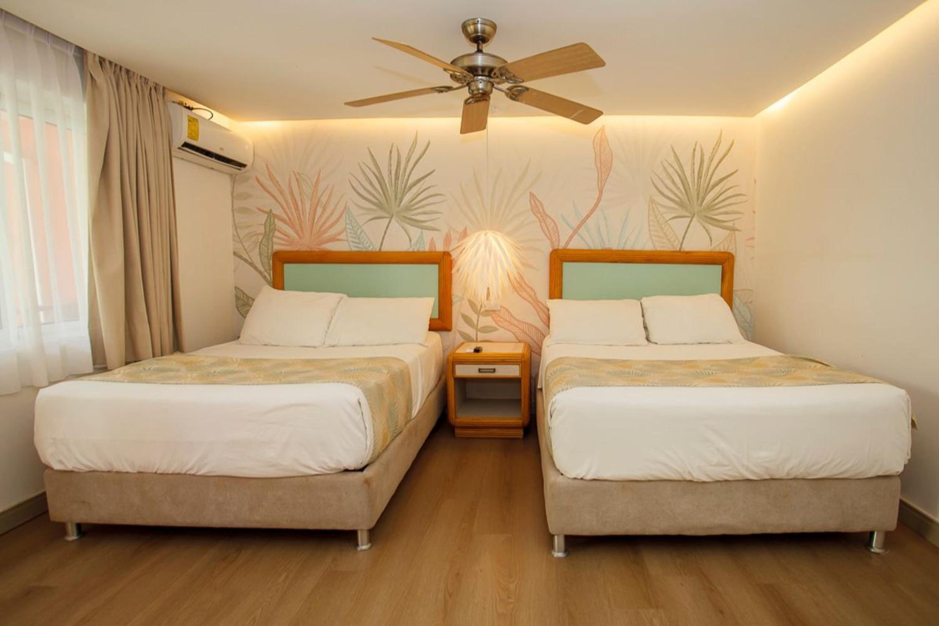 غرفة بسريرين مزدوجين، Hotel Cocoplum Beach 2/6