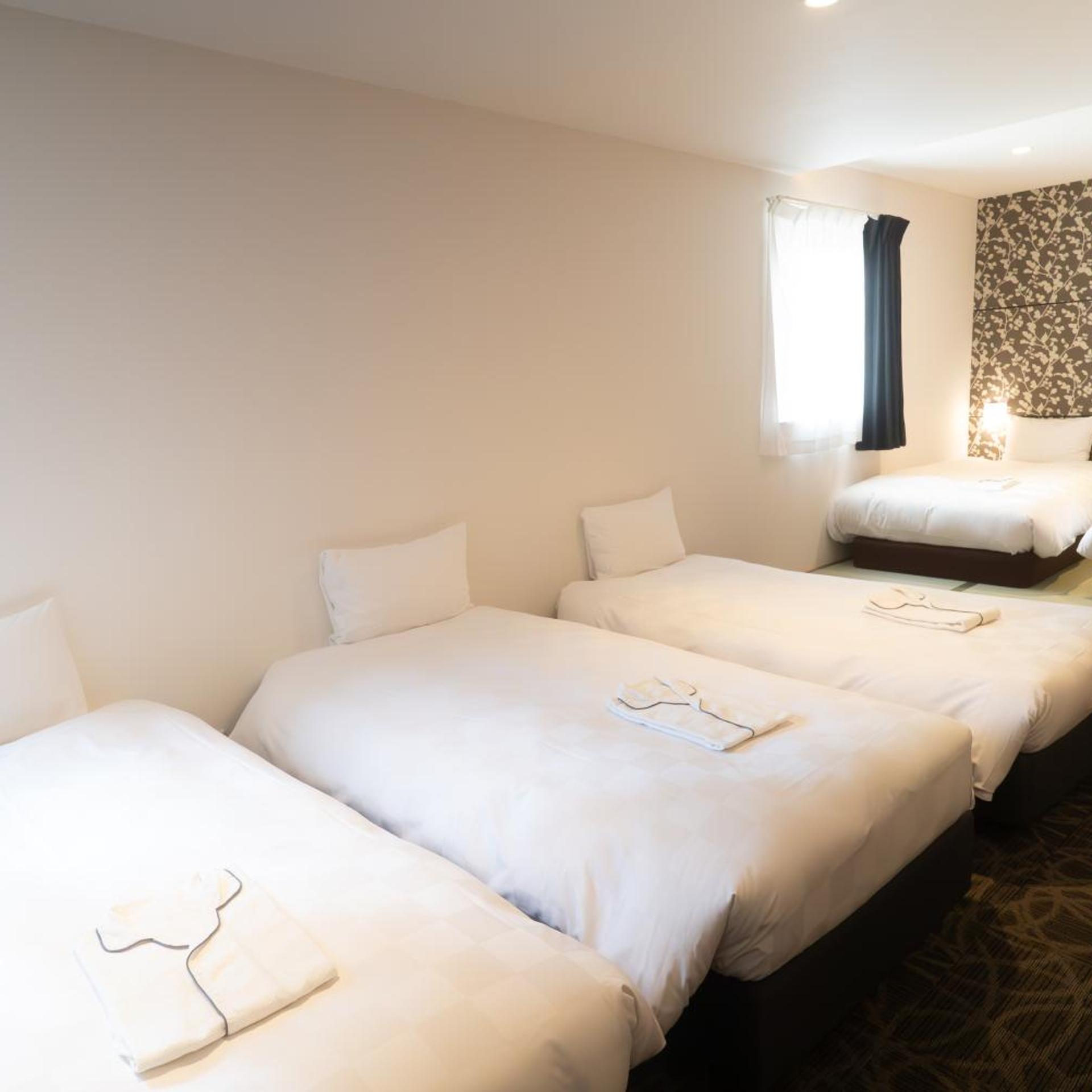 غرفة عائلية بسرير فردي، Sakura Garden Hotel 3/8