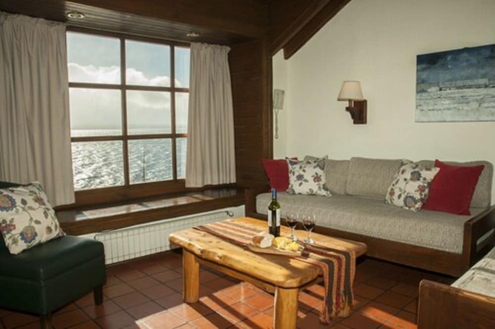 PAILAHUE LODGE & CABANAS 57/80