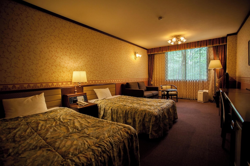 DELUXE, TWIN BEDS