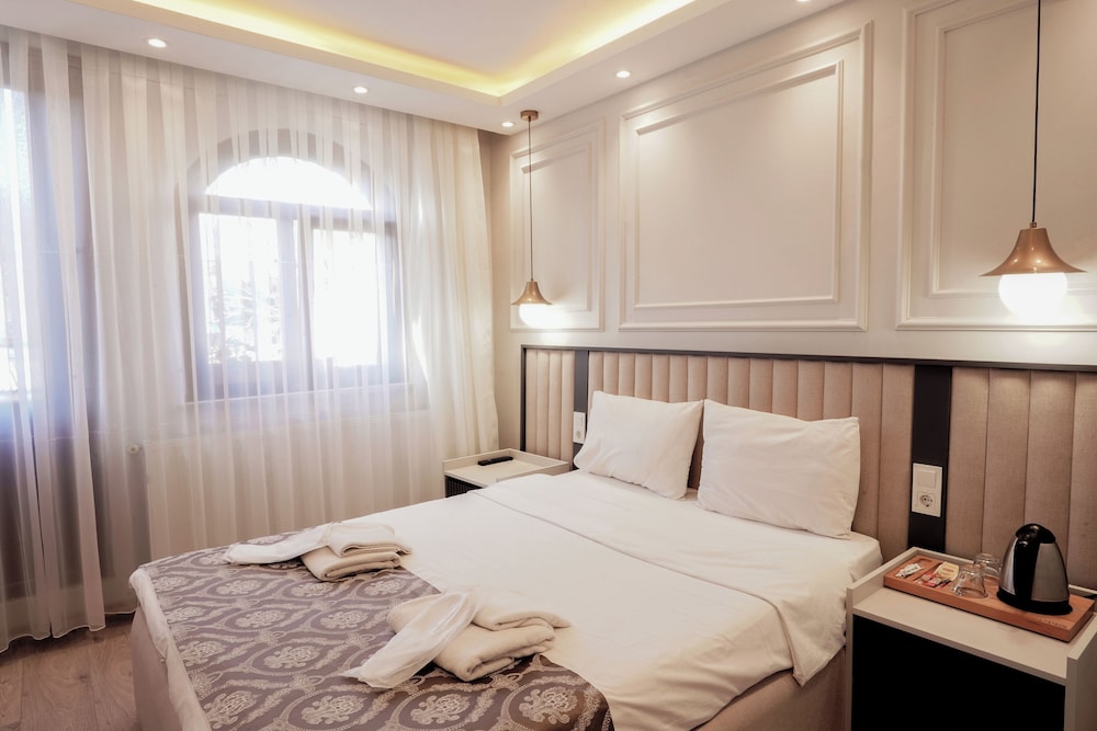 BLUE, DOUBLE BED, MOSQUE VIEW