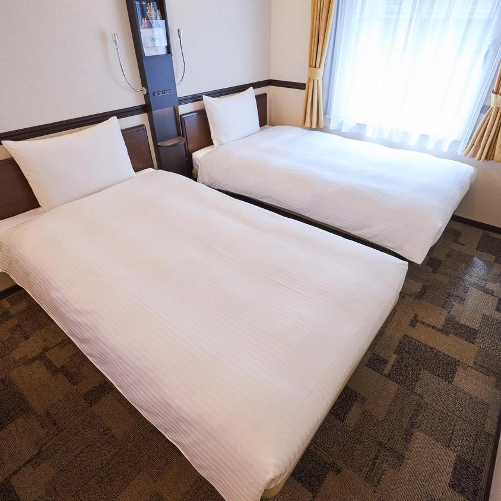 غرفة بسريرين منفصلين، Toyoko Inn Osaka Tsutenkaku Mae 4/10