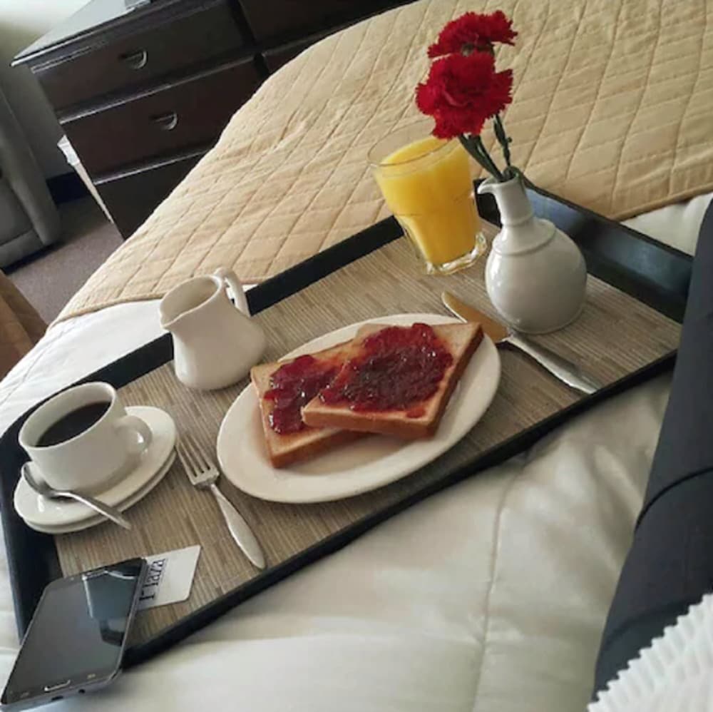 Hotel Plaza Suites 32/50