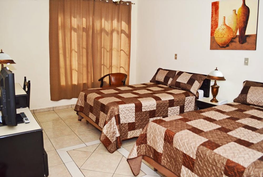 Hotel Tropico Inn 26/48