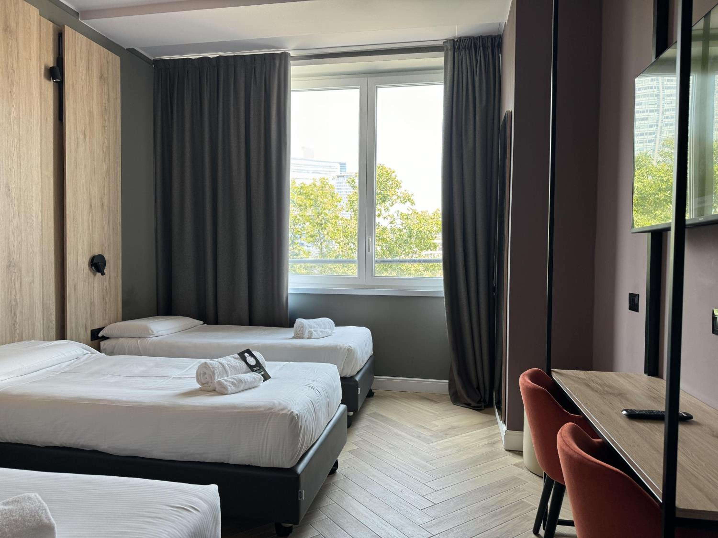غرفة قياسية ثلاثية بسرير فردي، B&B Hotel Milano Aosta 3/8