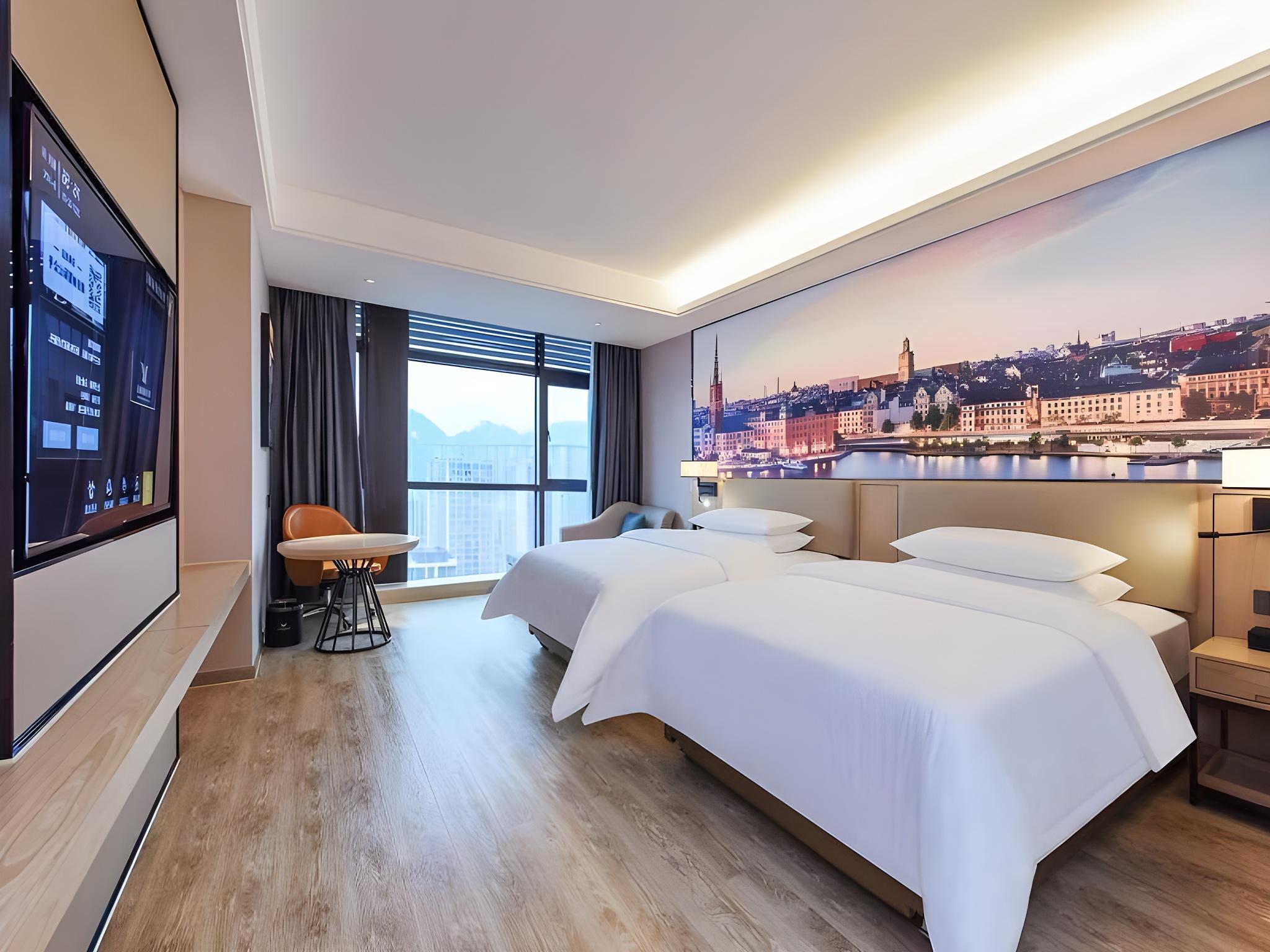 Vienna International Hotel (Nanchuan District Wanda Plaza) 33/56