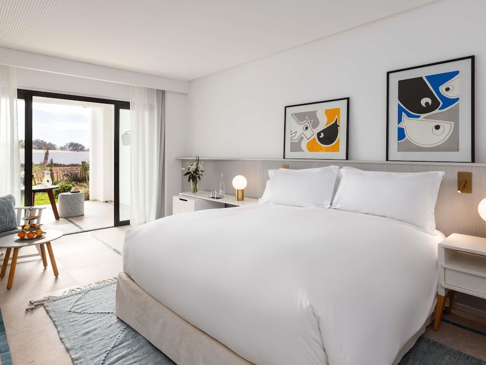 غرفة بريستيج بسرير كوين بإطلالة على البحر، SOFITEL AGADIR THALASSA SEA AND SPA 2/3