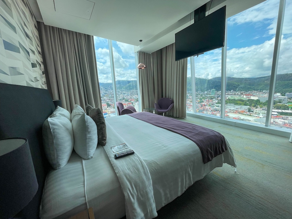 MASTER, SUITE, 1 KING AND 2 DOUBLE BEDS