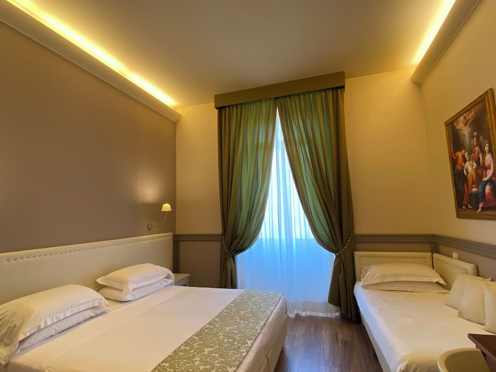 غرفة ديلوكس بسريرين منفصلين بإطلالة على الحديقة، Basilica Hotel 4/10