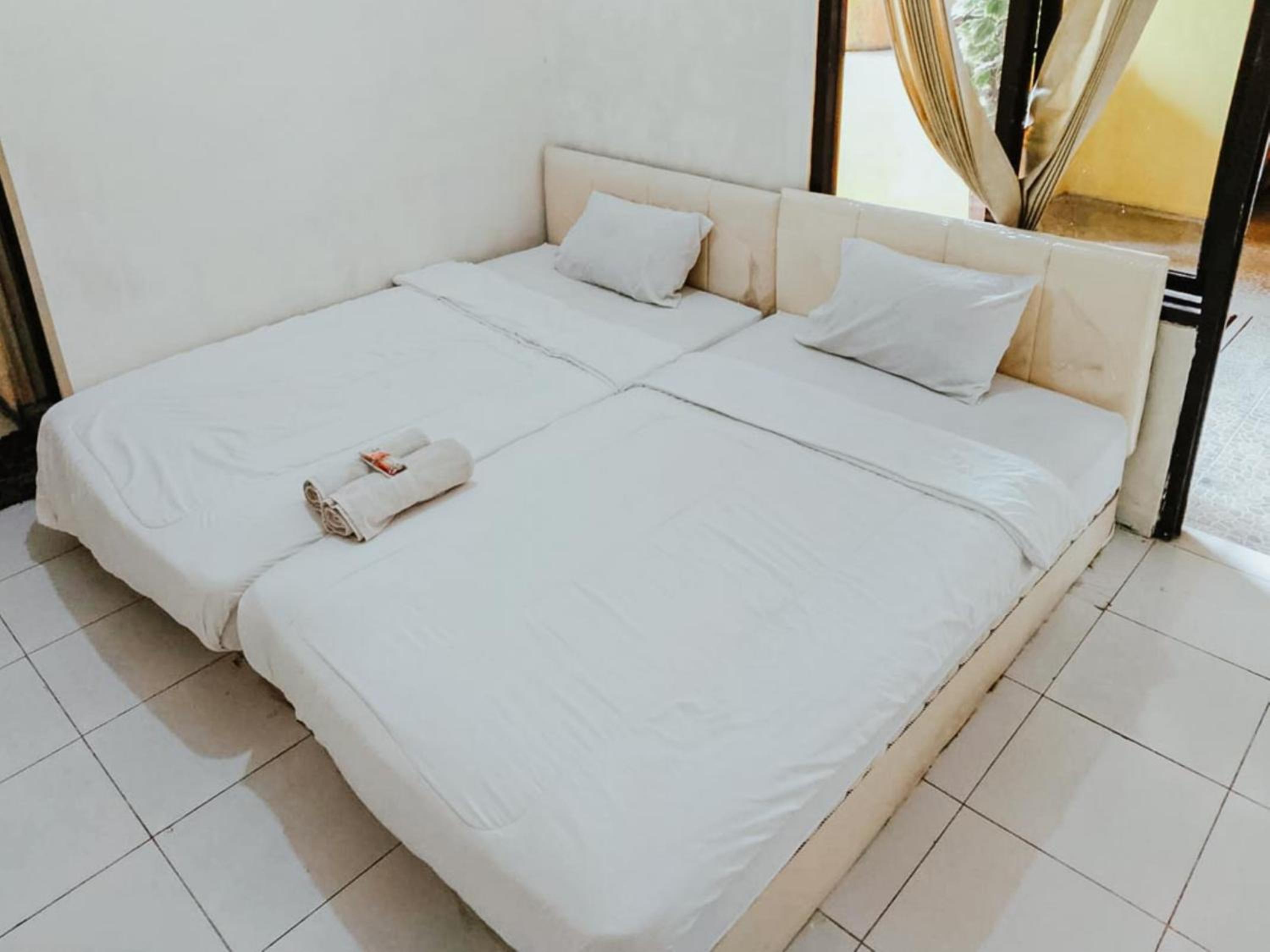 OYO 3895 D'Luck Homestay 12/37