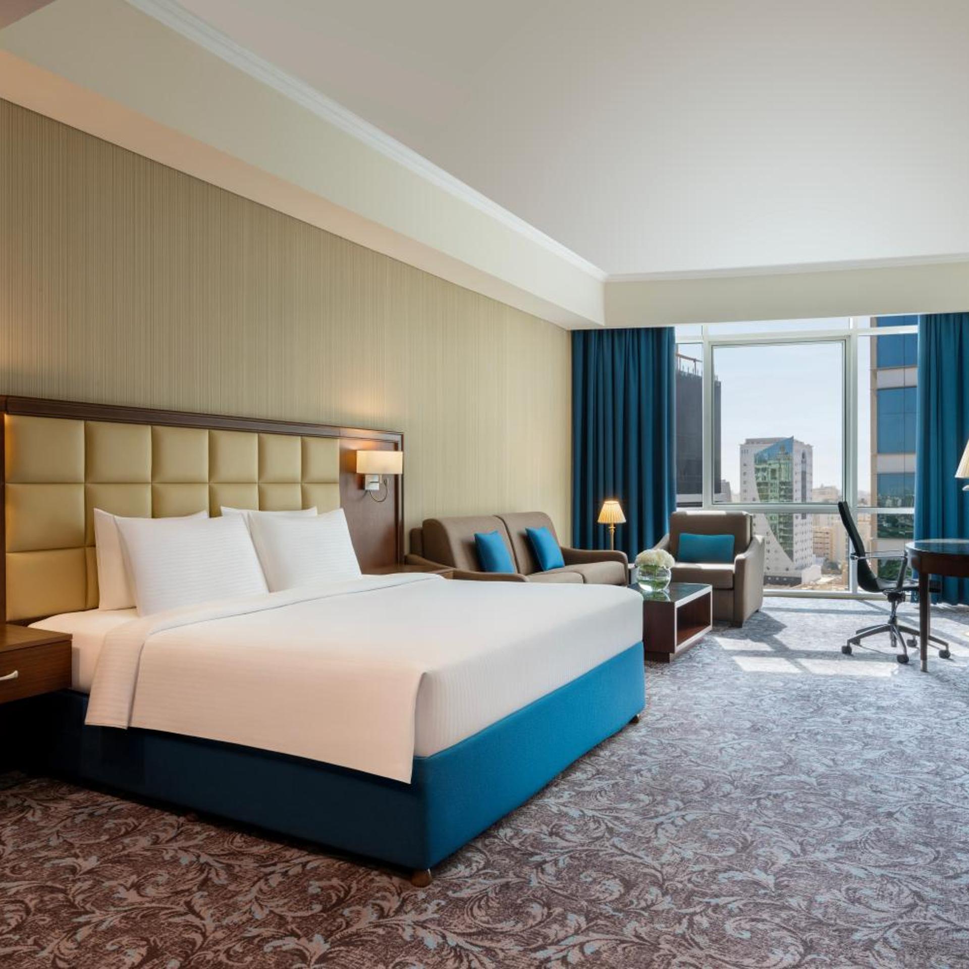 Deluxe King Room with Sofa Bed