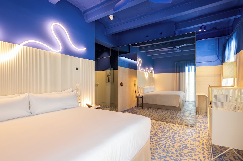 جناح جونيور بسرير كينج بشرفة، Terreno Barrio Hotel 4/10