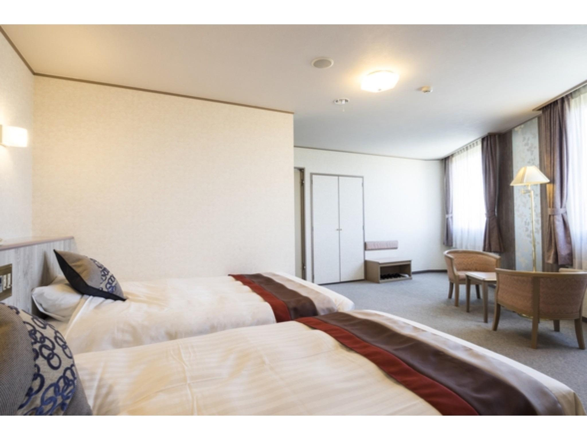 Semi Room, Twin Beds, 1 Double and 1 Semi Double Bed