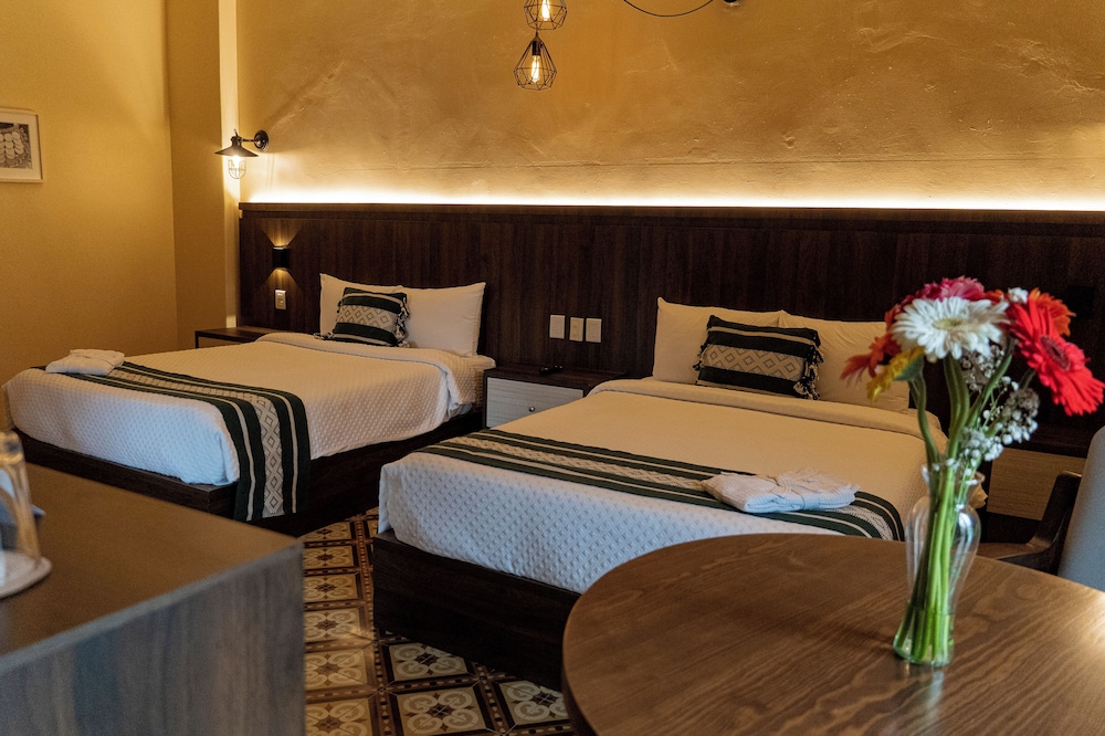 غرفة جونيور بسريرين مزدوجين، Casona Oaxaca 10/10