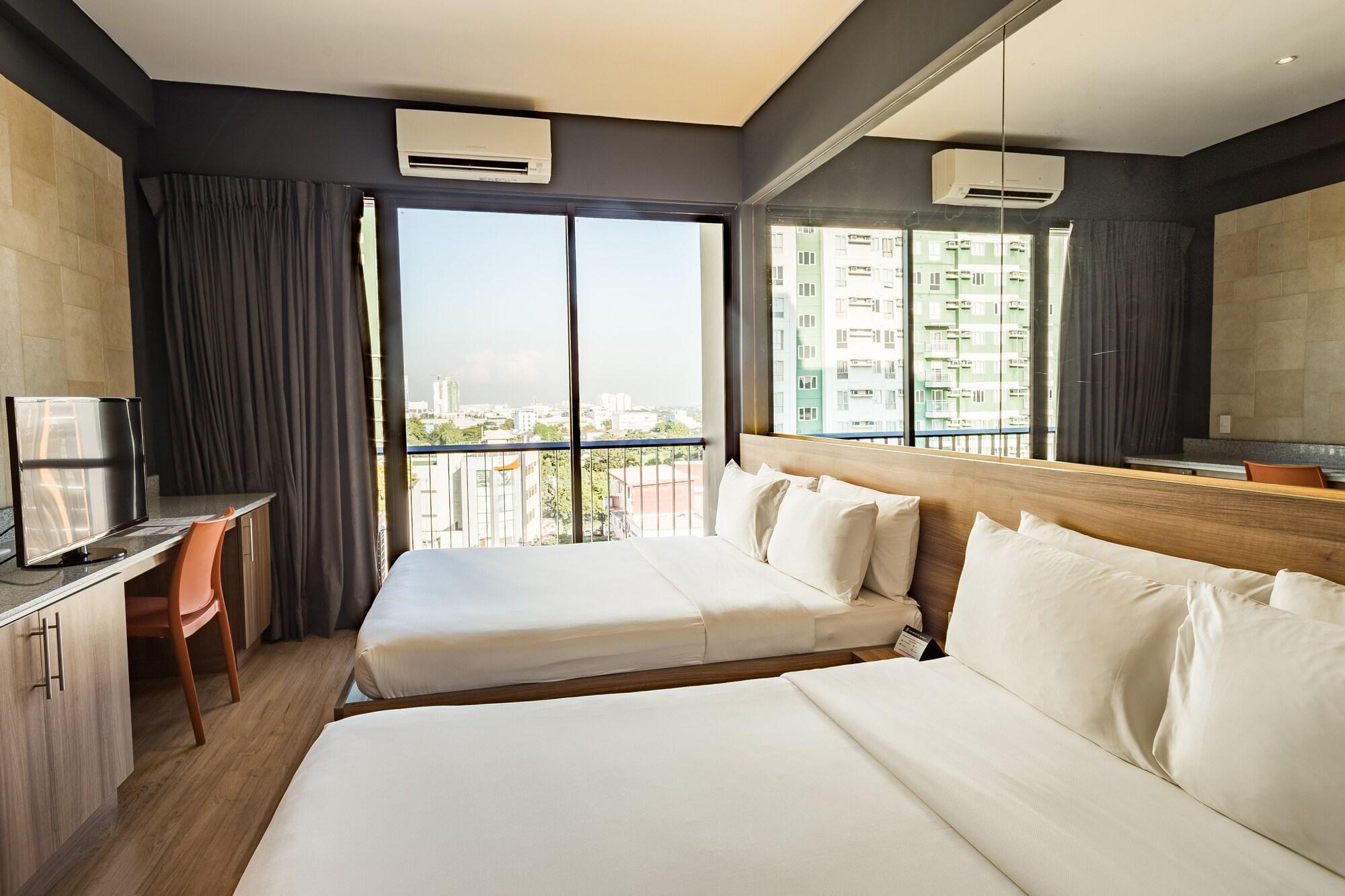 غرفة رباعية بسرير كوين، Azumi Boutique Hotel 4/9