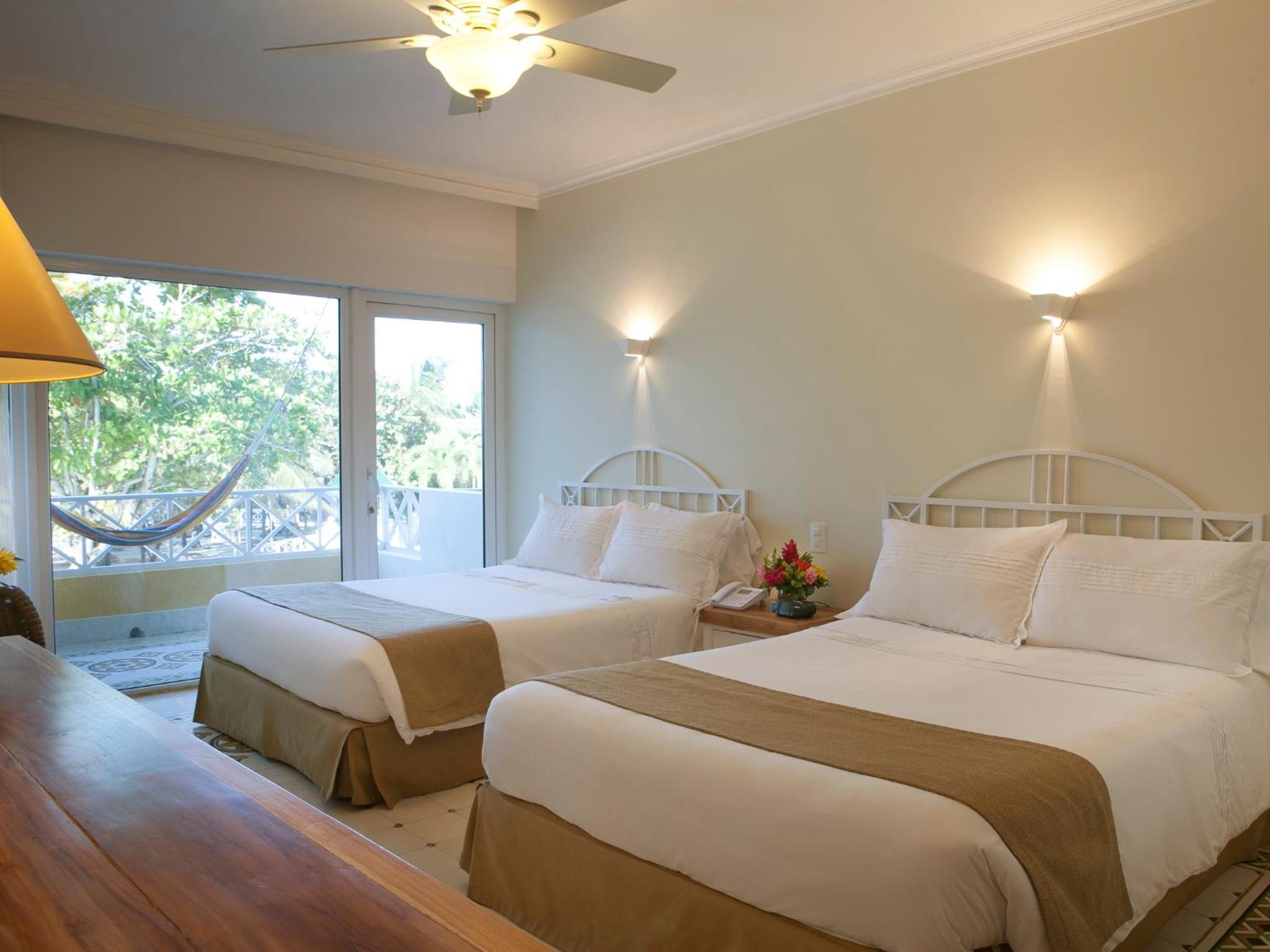 Superior, 2 Queen Beds, Las Americas Casa de Playa 2/9