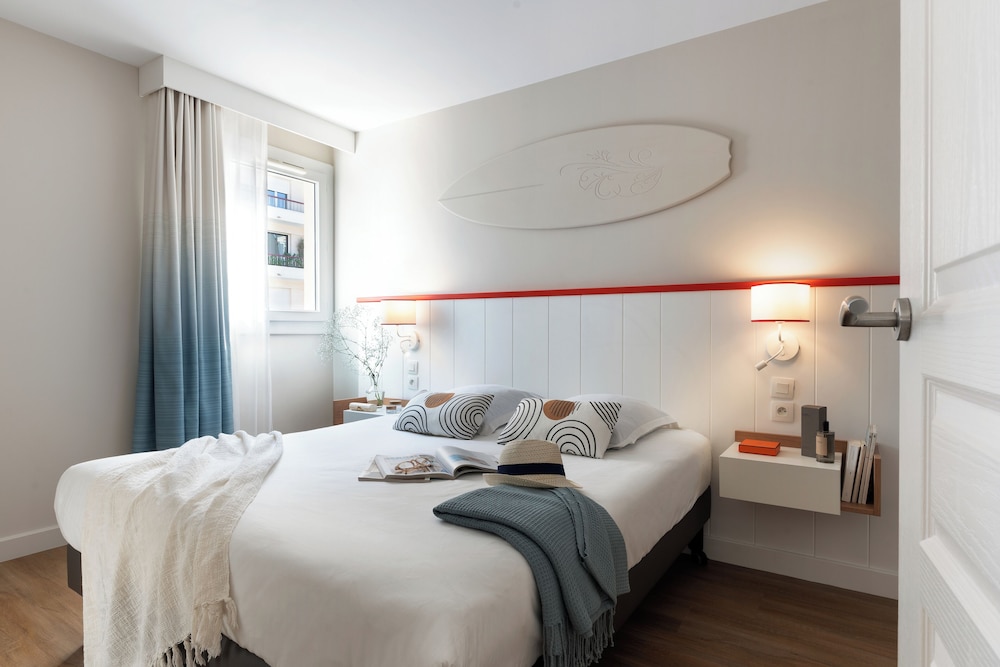 شقة بسريرين منفصلين بغرفة نوم واحدة مع أريكة، Pierre And Vacances Premium Residence Haguna Formerly Pierre And Vancances Residence Haguna 2/3
