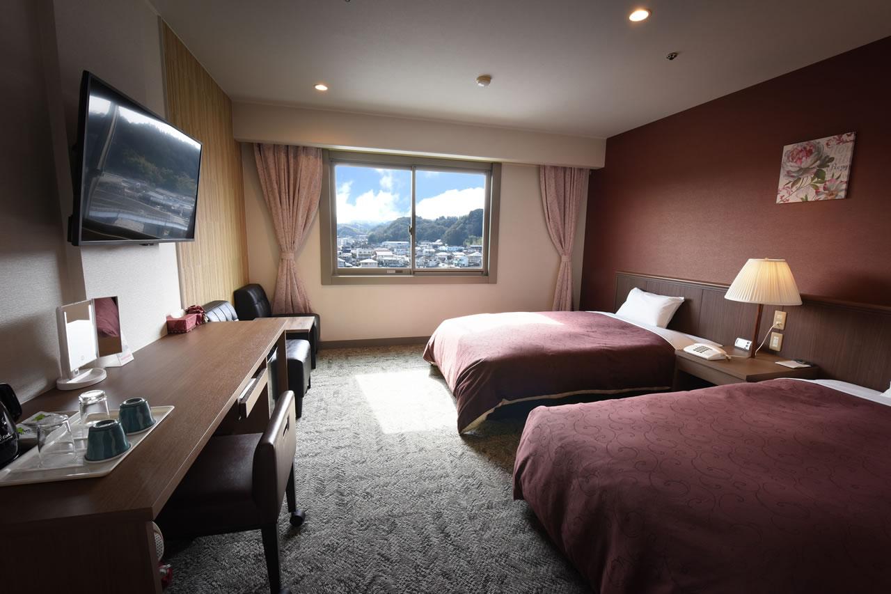 جناح جونيور ديلوكس بسريرين منفصلين بإطلالة على النهر