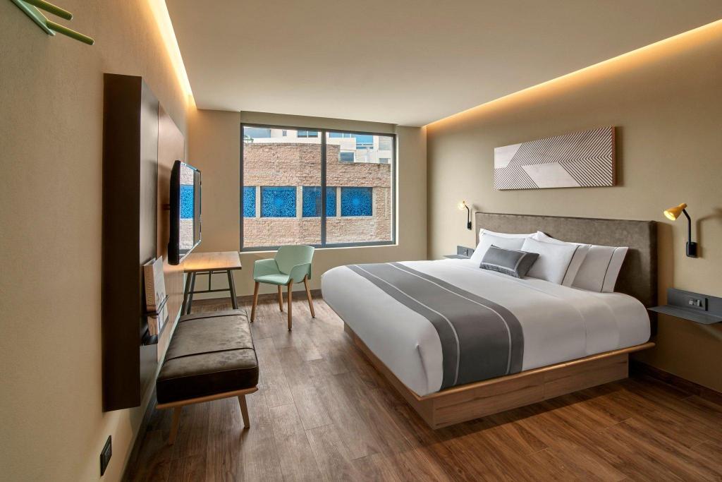 Suite, King Bed, Street View, Sofa, Balcony or Terrace