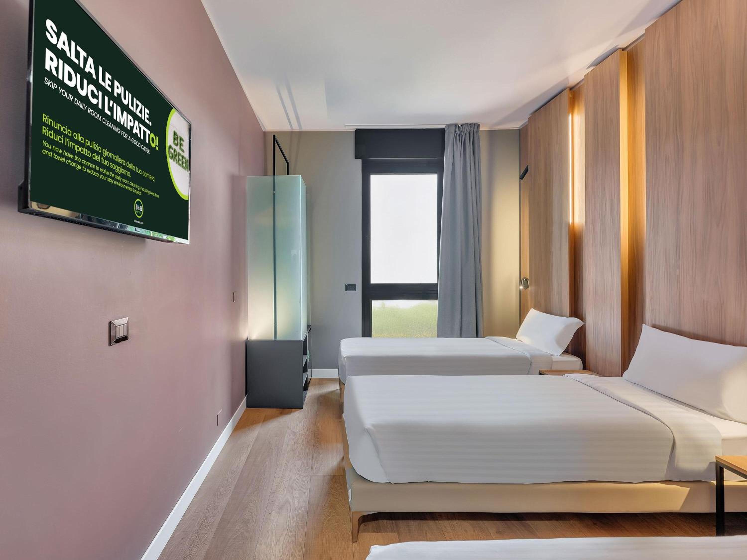 غرفة ثلاثية بسرير كوين وسرير فردي، B&B Hotel Milano Portello 3/9