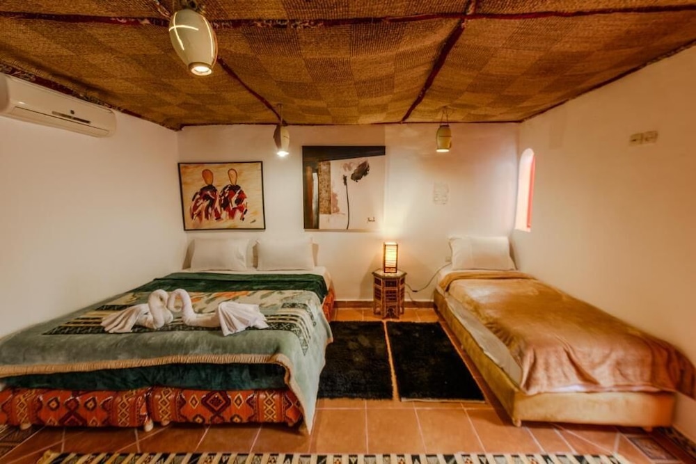 غرفة ديلوكس ثلاثية بسرير مزدوج وسرير فردي، Riad Amira Luxury Palace 5/10