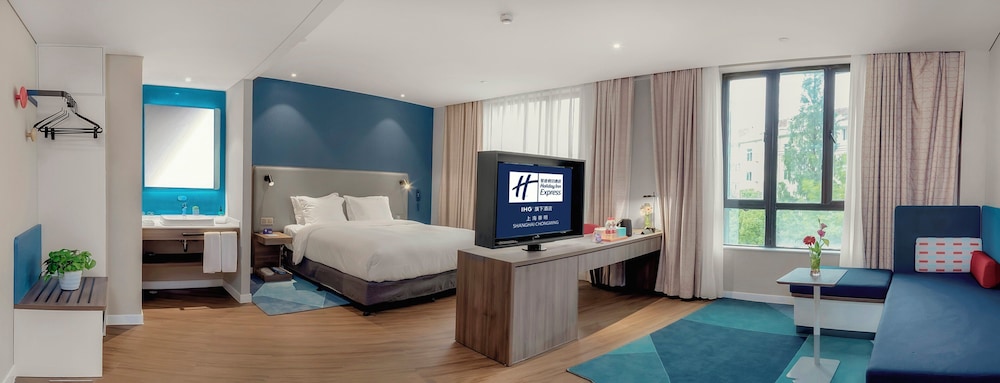 جناح بسرير كينج بمنطقة جلوس في الطابق العلوي، Holiday Inn Express Shanghai Chongming 3/9