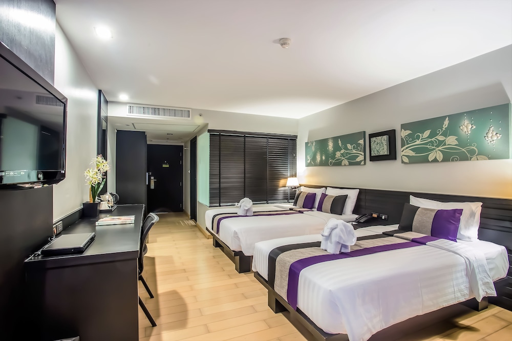 غرفة غراند ديلوكس ثلاثية بسرير كوين وسرير فردي، Nouvo City Hotel 2/3