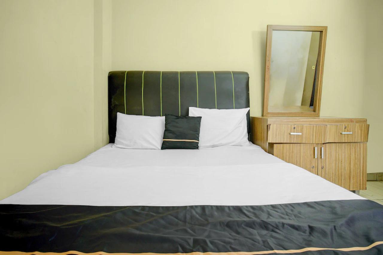 Room at Hotel O near Stadion Pahoman formerly Rama Shinta Guest House, BANDAR LAMPUNG