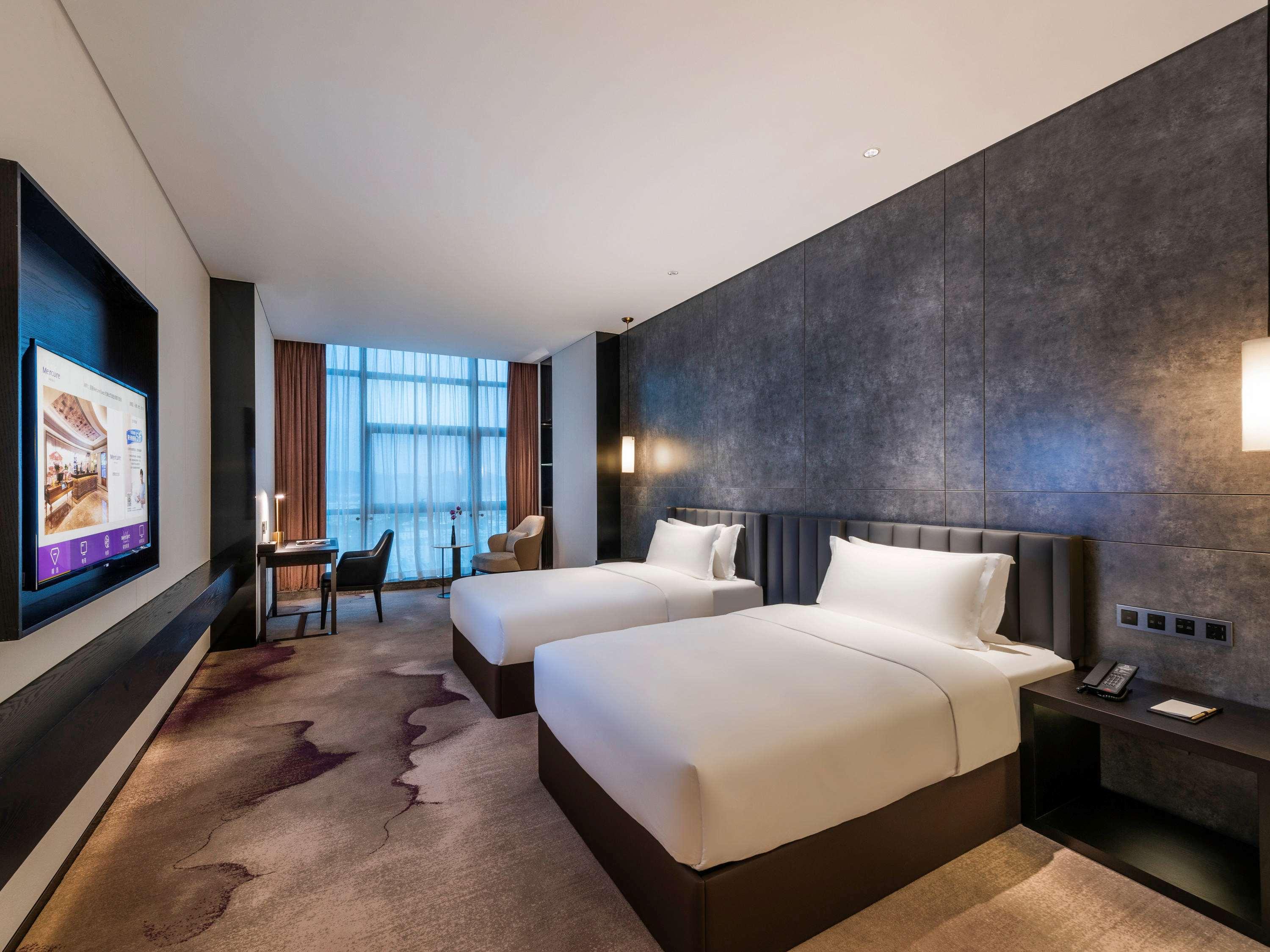 غرفة تنفيذية بسريرين منفصلين