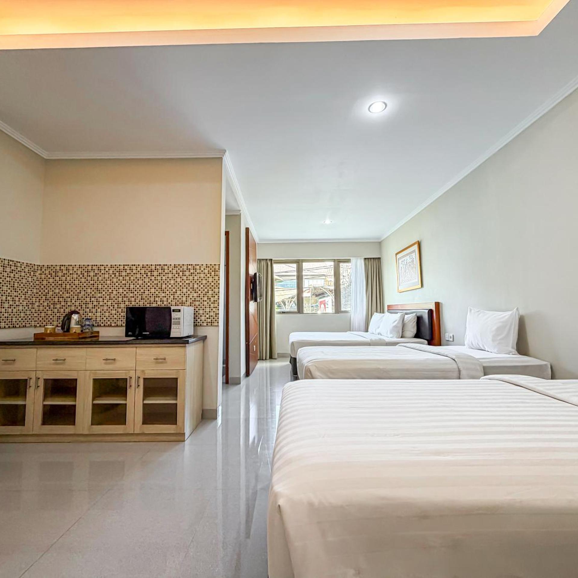 غرفة عائلية بسرير فردي، Svarna Hotel Sanur 5/7