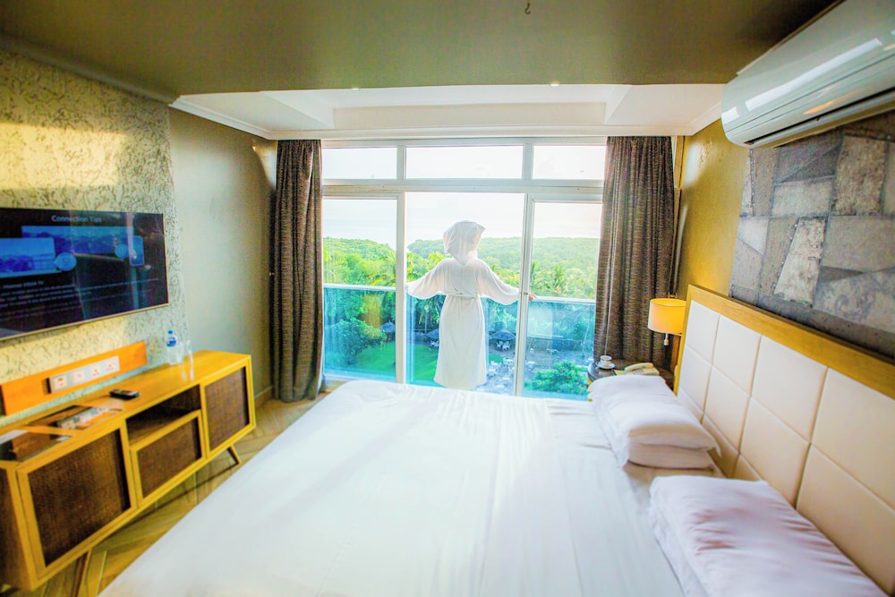 جناح جونيور بسرير مزدوج وسرير فردي، Tanga Beach Resort & Spa 5/10