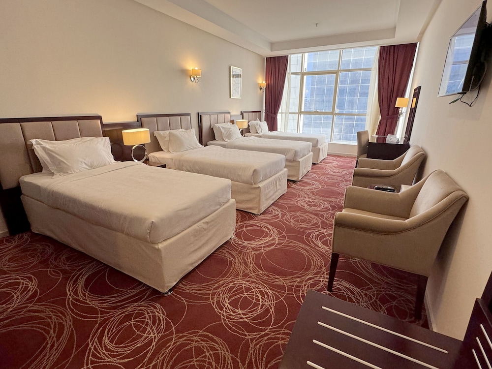 غرفة قياسية رباعية بأربعة أسرّة، ابراج الريان المكية(Al Rayyan Makiya Towers Hotel) 3/9