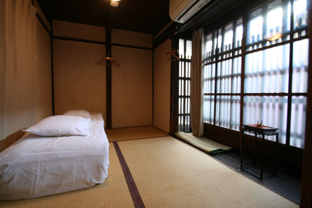 Design, 2 Futon Beds, Shared Bathroom