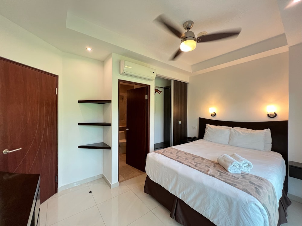 2 Bedrooms, Family Suite, 2 Queen Beds, 2 Bathrooms, Sofa, Living Area, 3 Balconies, Kitchen