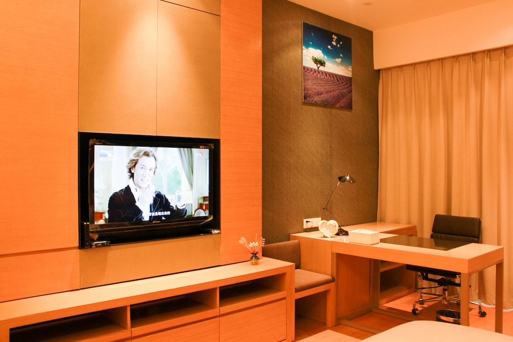 Xingyi International Hotel Poly Store 48/70