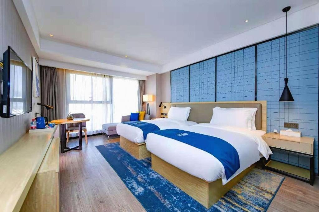 Echarm Hotel Xiantao Yuantai Weilaicheng، Xiantao 22/47