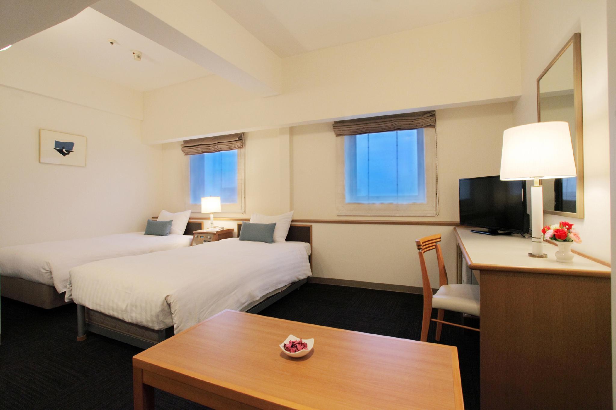DELUXE, TWIN BEDS, SMOKING