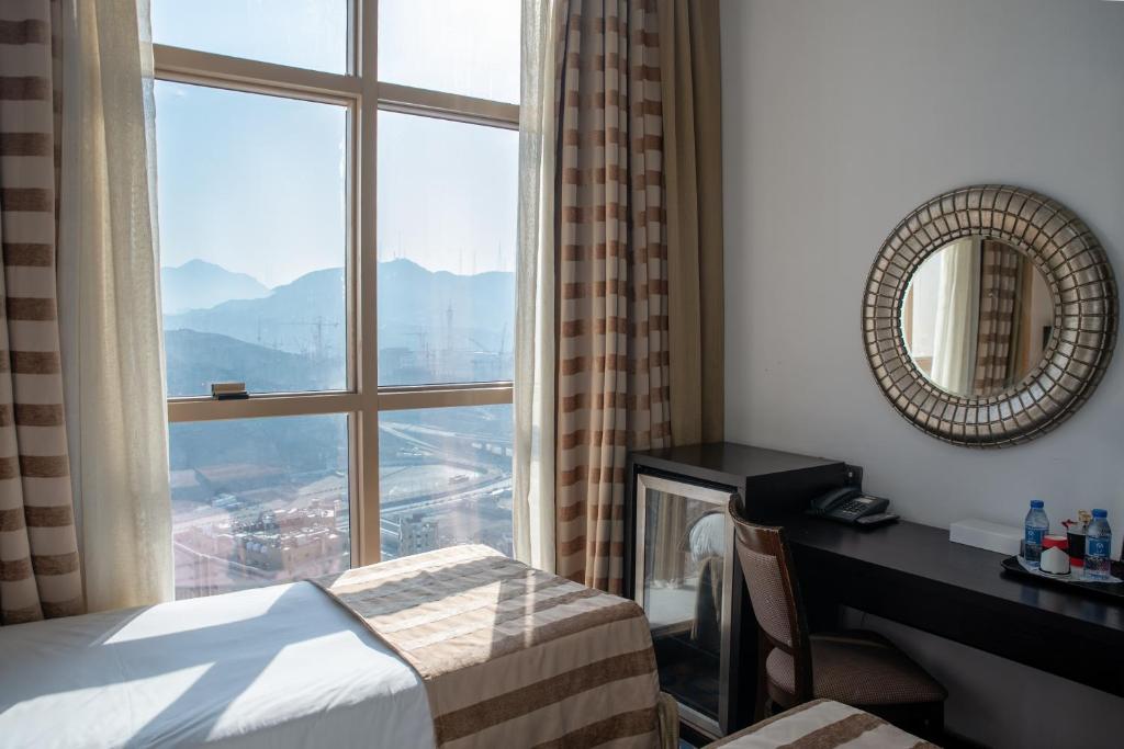 غرفة قياسية بسريرين منفصلين، فندق ابراج الكسوة(Al Kiswa Towers Hotel) 2/2