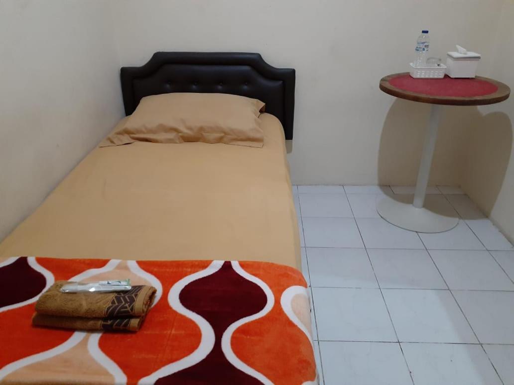 SPOT ON 3988 Kost Carmelia Baranangsiang Syariah 25/45