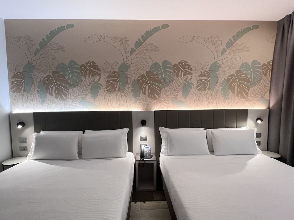 غرفة عائلية بسرير كوين، iH Hotels Milano Centrale 3/9