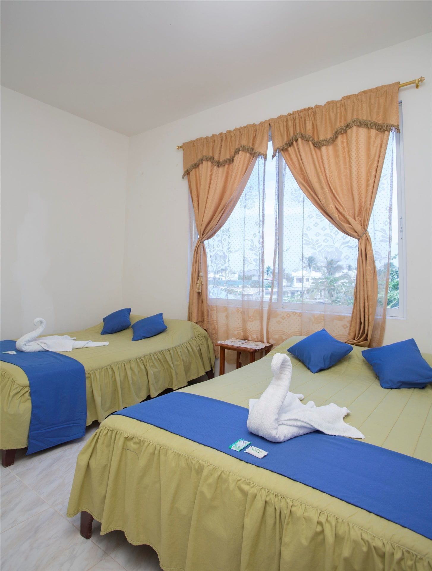 Family, 1 Double and 3 Single Beds