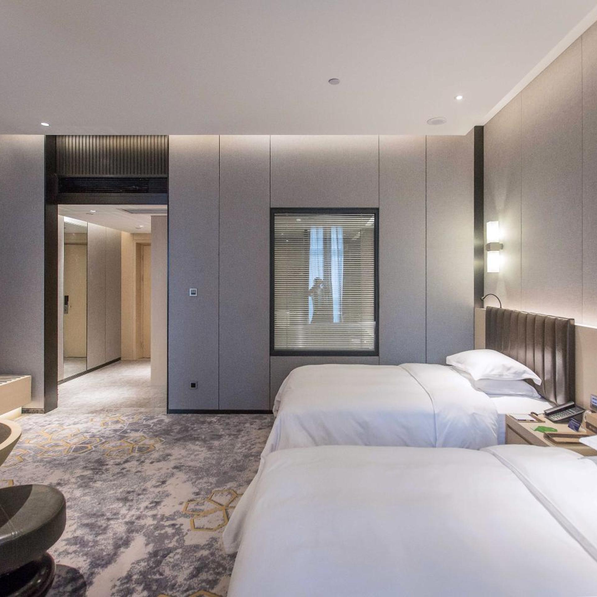 غرفة تنفيذية بسريرين منفصلين بإطلالة على المدينة، Grand Metropark Hotel Liyuan Chongqing 1/5