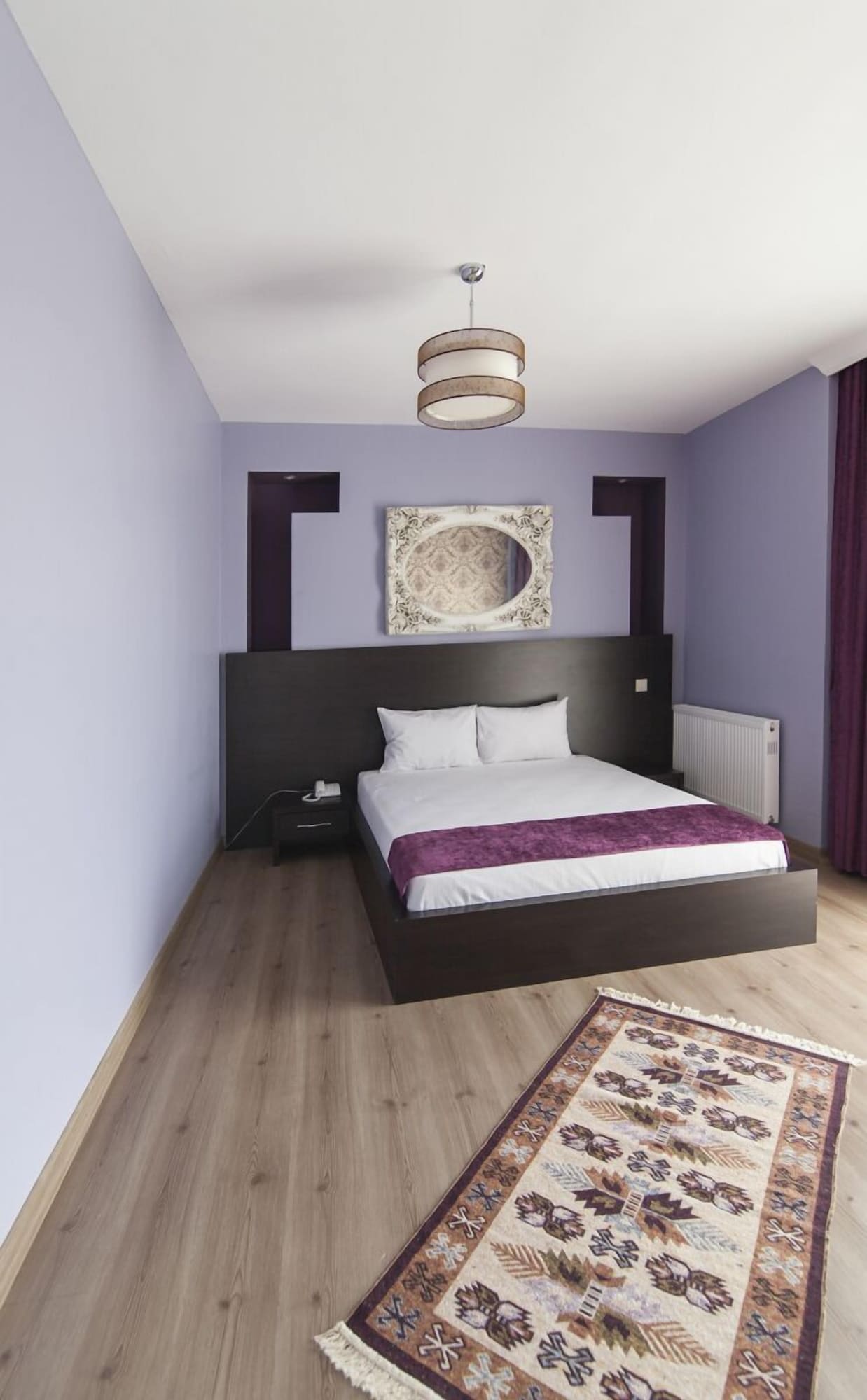جناح ديلوكس بسرير كينج مع أريكة، Bossuite Hotel Maltepe 5/6