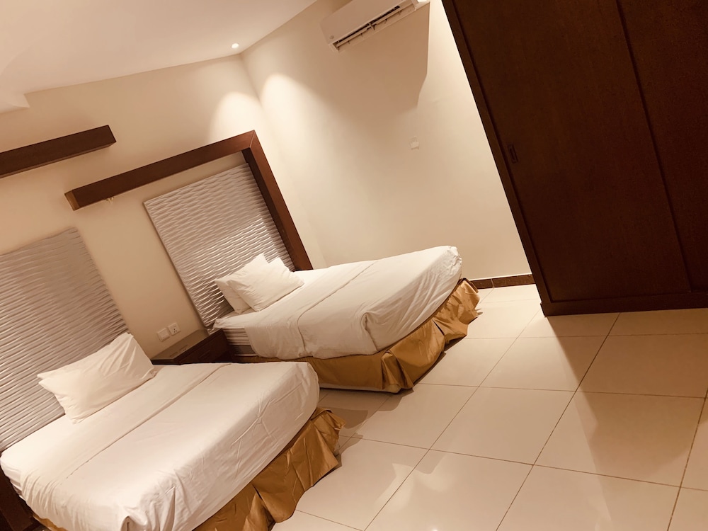 أجنحة طوق(Tooq Suites) 25/50