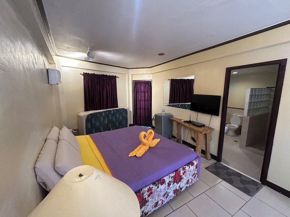 غرفة قياسية بسرير مزدوج مع أريكة، Alta Cebu Village Garden Resort 4/6